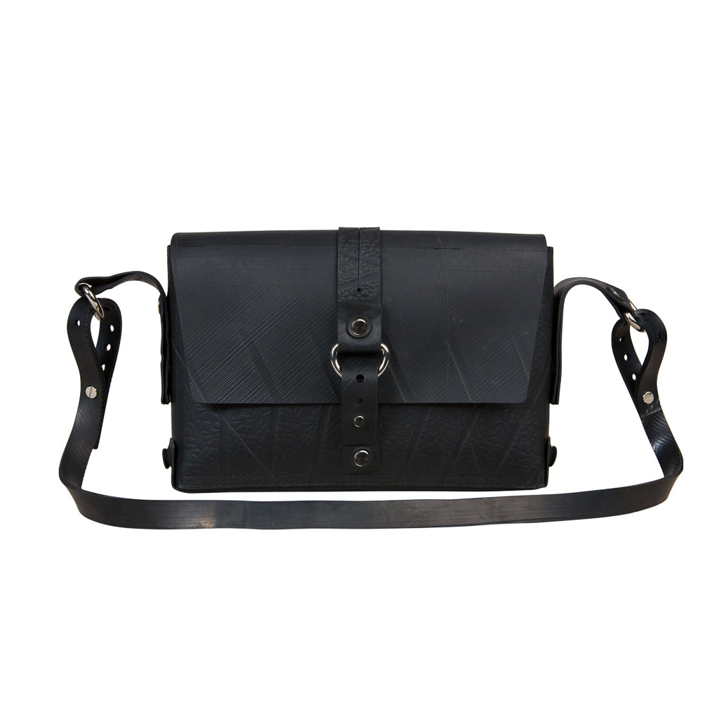 Paguro Upcycle black vegan handbag with adjustable shoulder strap and front flap closure