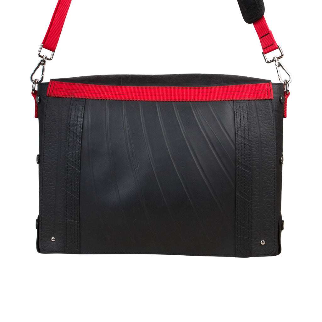 Paguro Upcycle recycled rubber messenger bag with black body and red adjustable strap