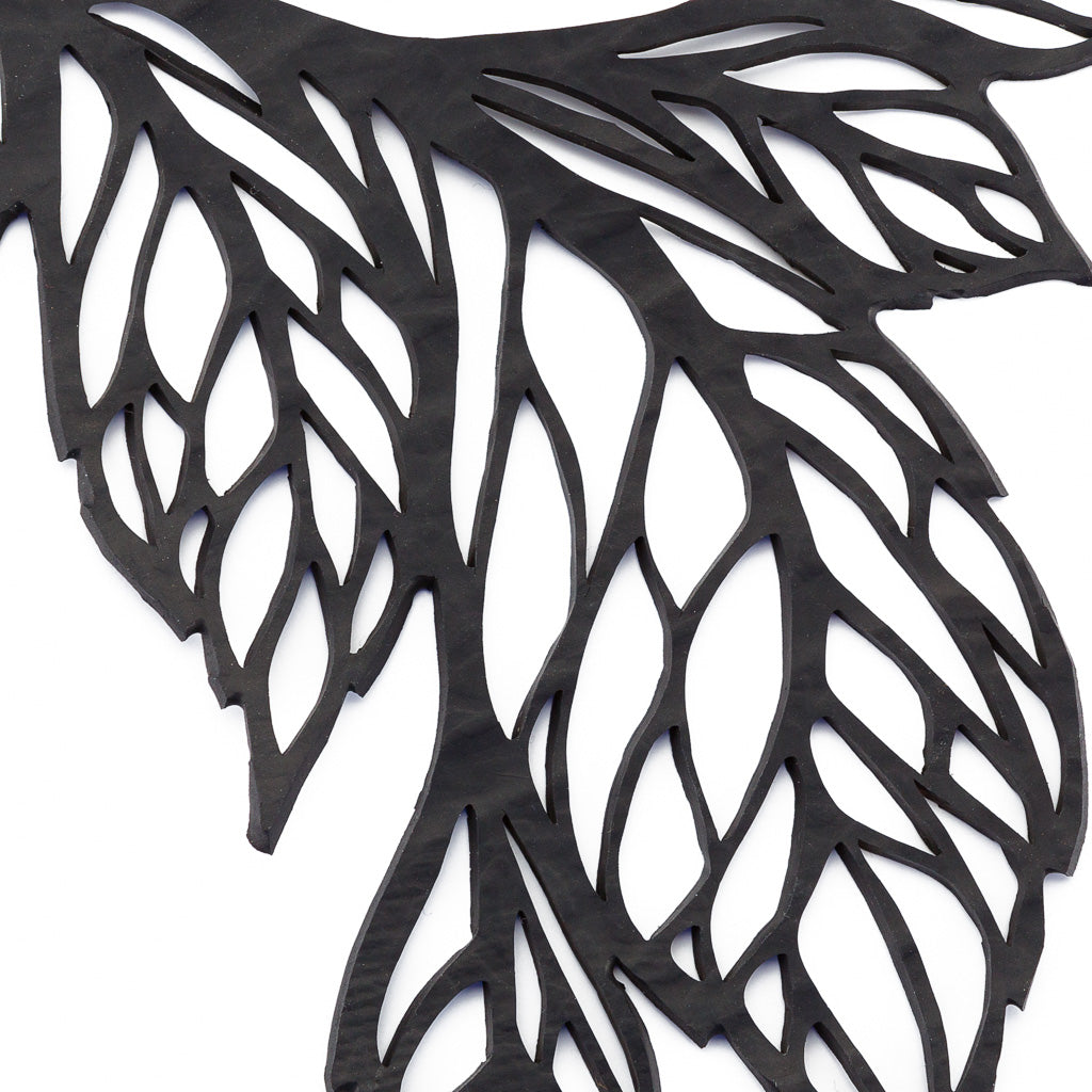 Paguro Upcycle recycled rubber leaf necklace featuring intricate cutout leaf design in black