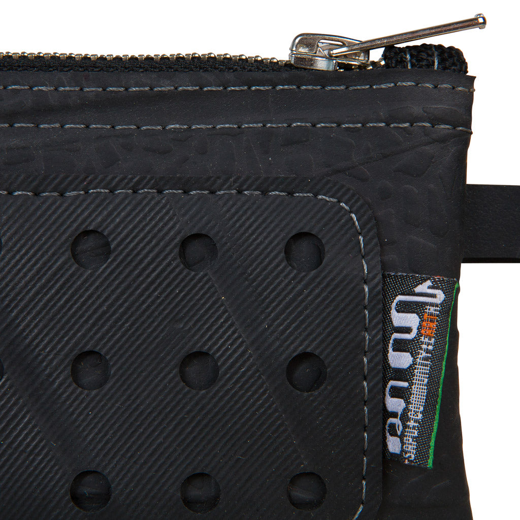 Paguro Upcycle recycled rubber wristlet pouch in black with zipper and textured holes