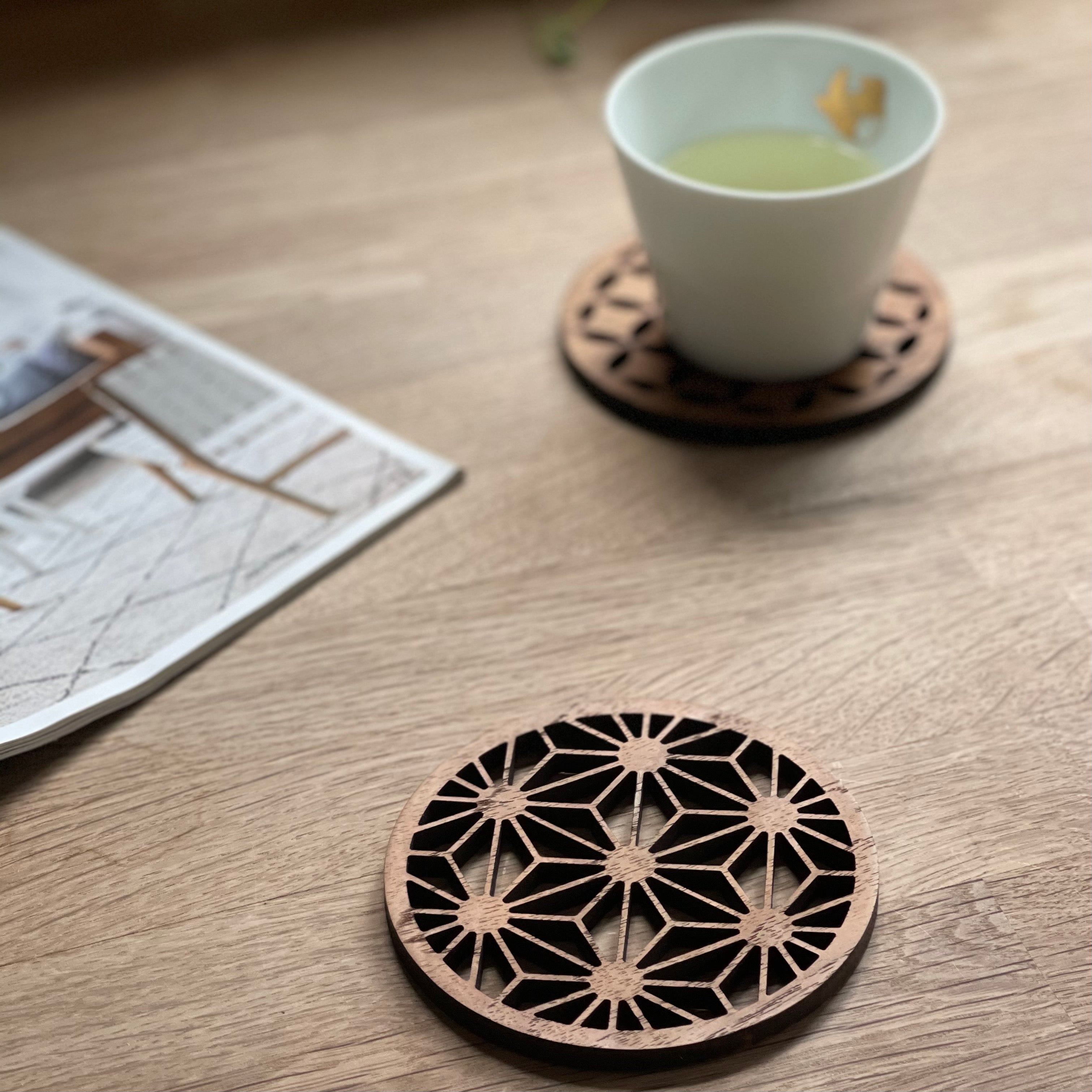 Paguro Upcycle Japanese pattern drink coasters with intricate geometric design on wooden surface