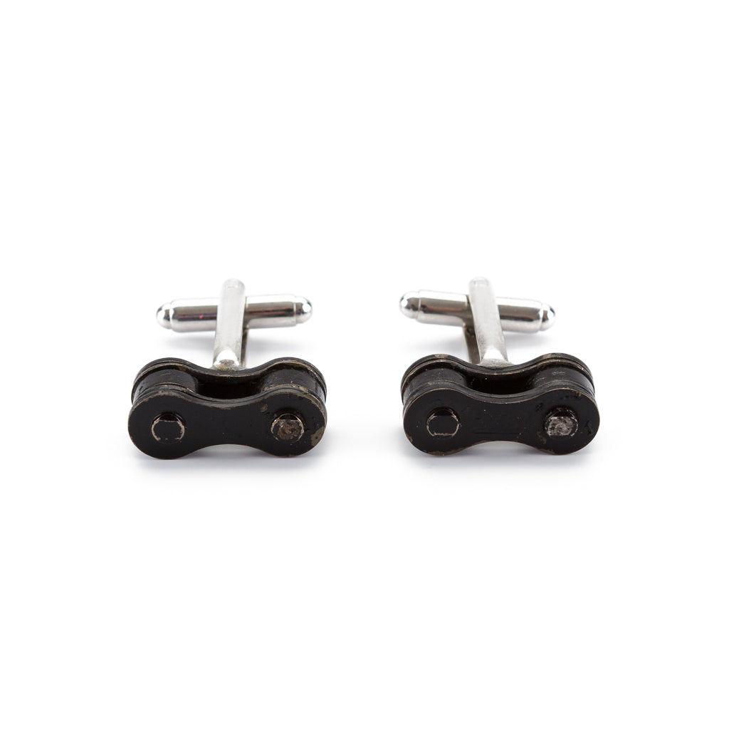 Paguro Upcycle recycled bicycle chain cufflinks with silver-tone fasteners on white background