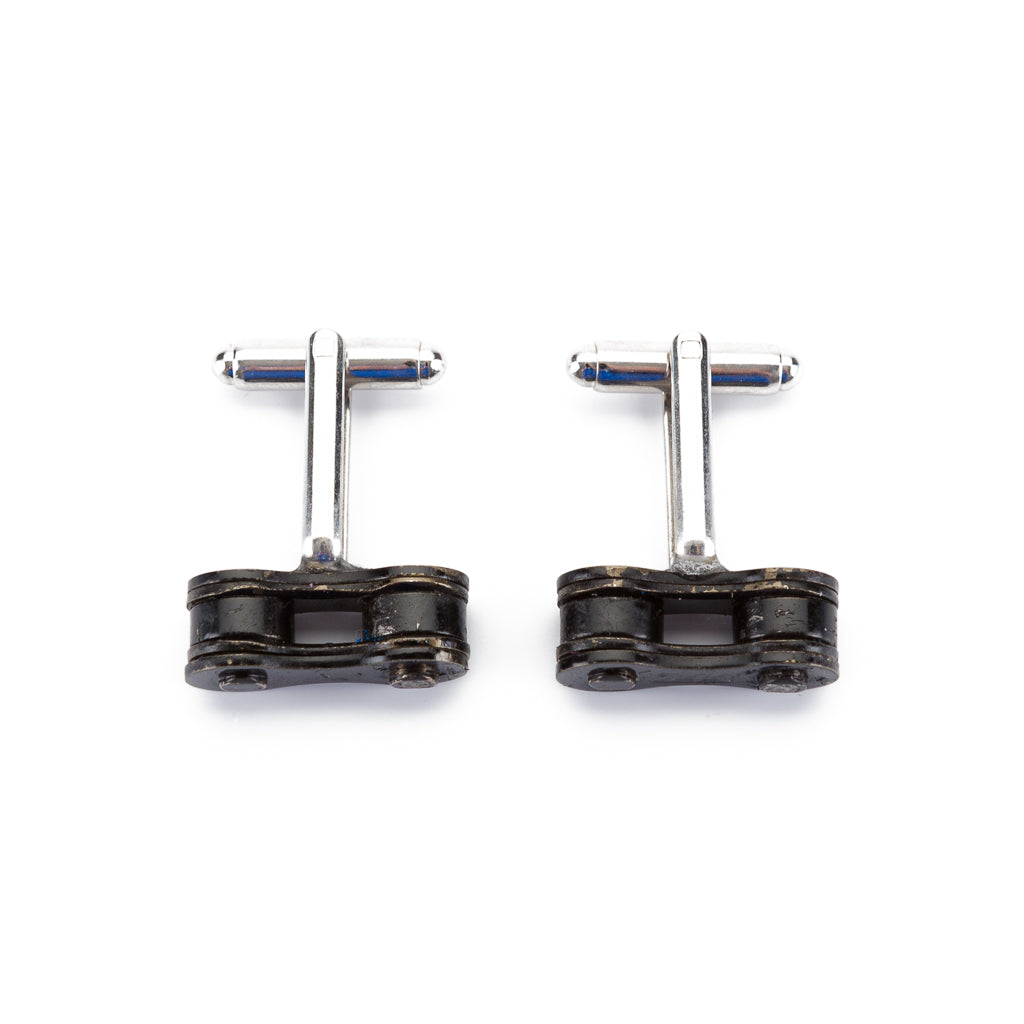 Paguro Upcycle recycled bicycle chain cufflinks with silver-tone fastening on white background
