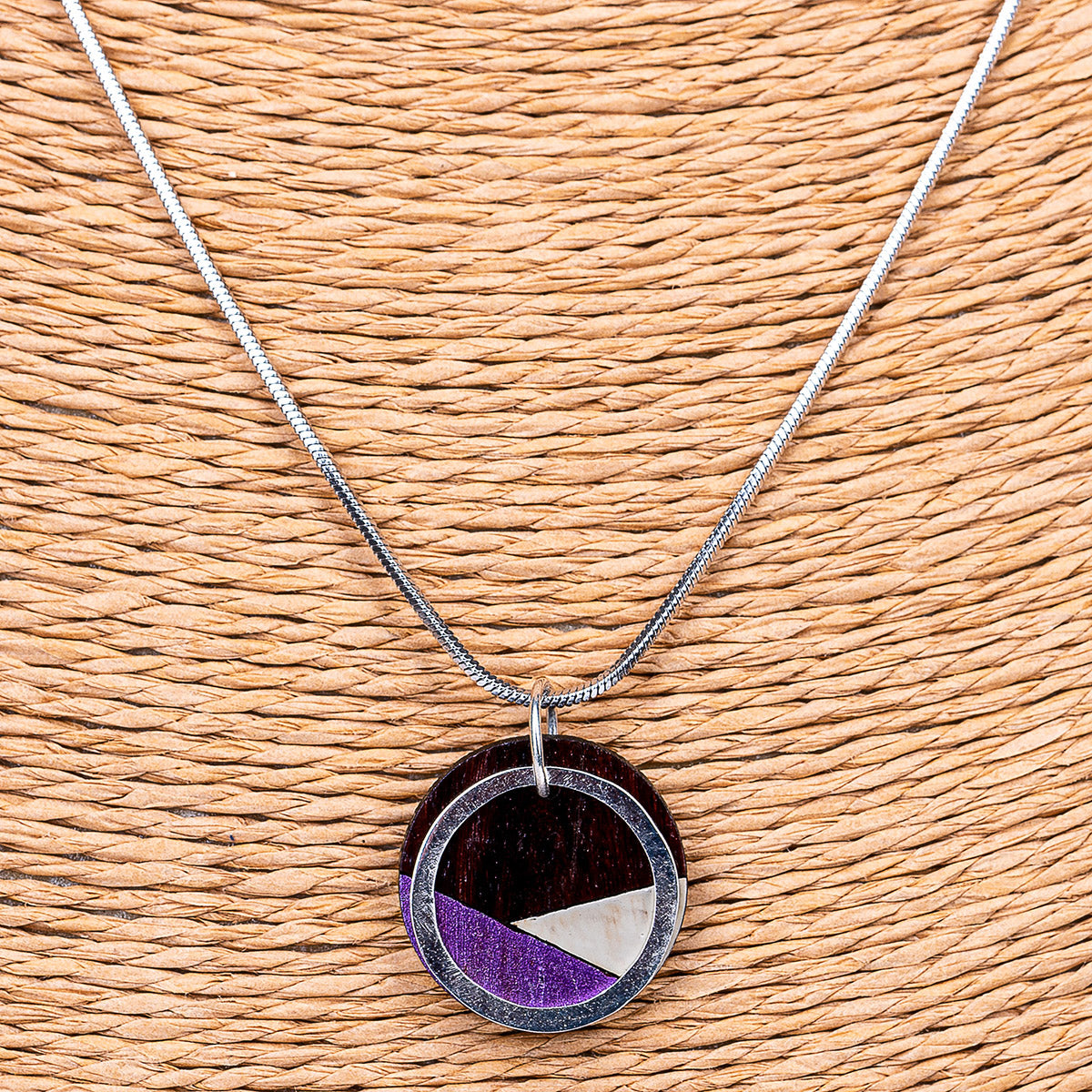 Paguro Upcycle recycled wood silver necklace with geometric purple and white inlay pendant