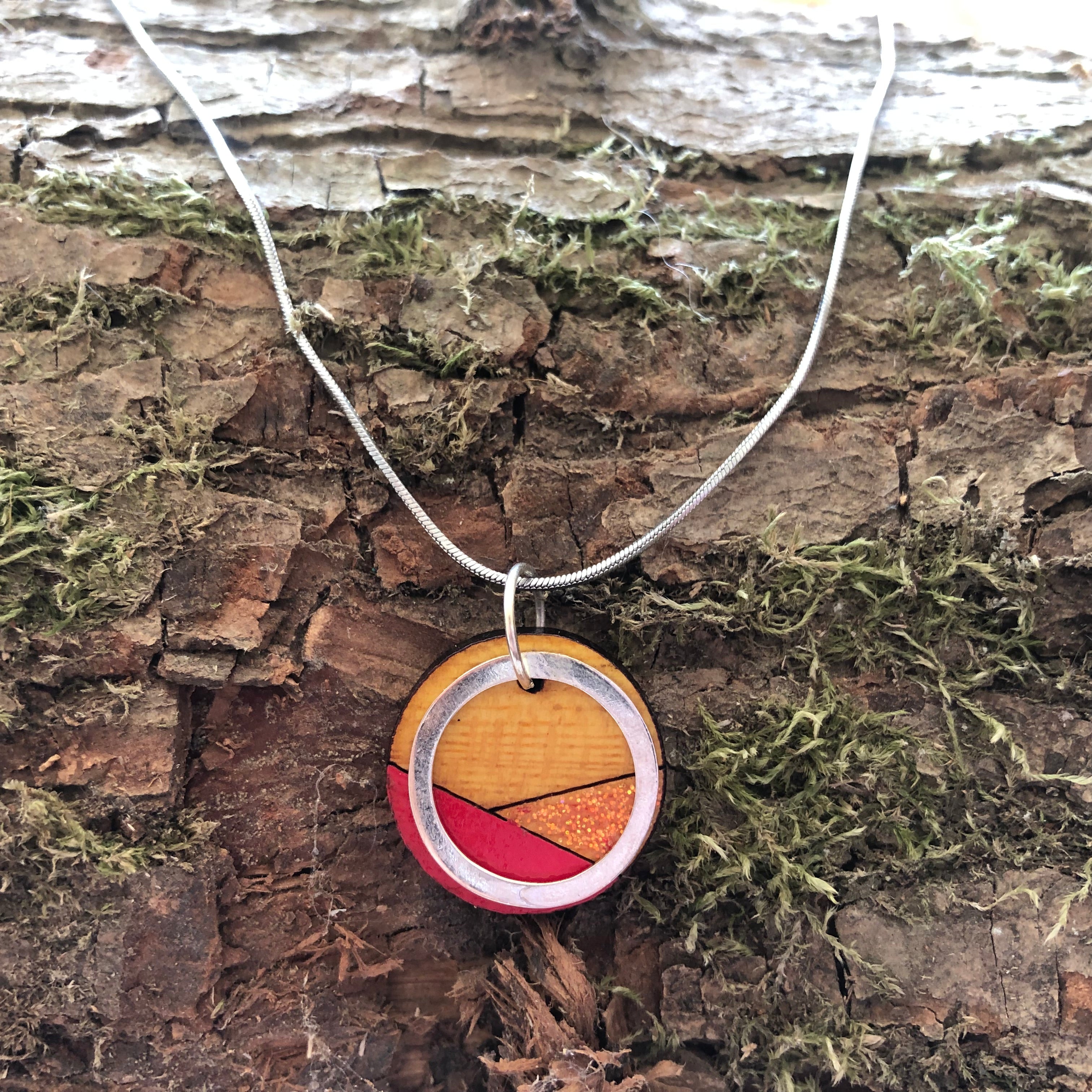 Paguro Upcycle recycled wood silver necklace with round multicolor wood pendant on silver chain