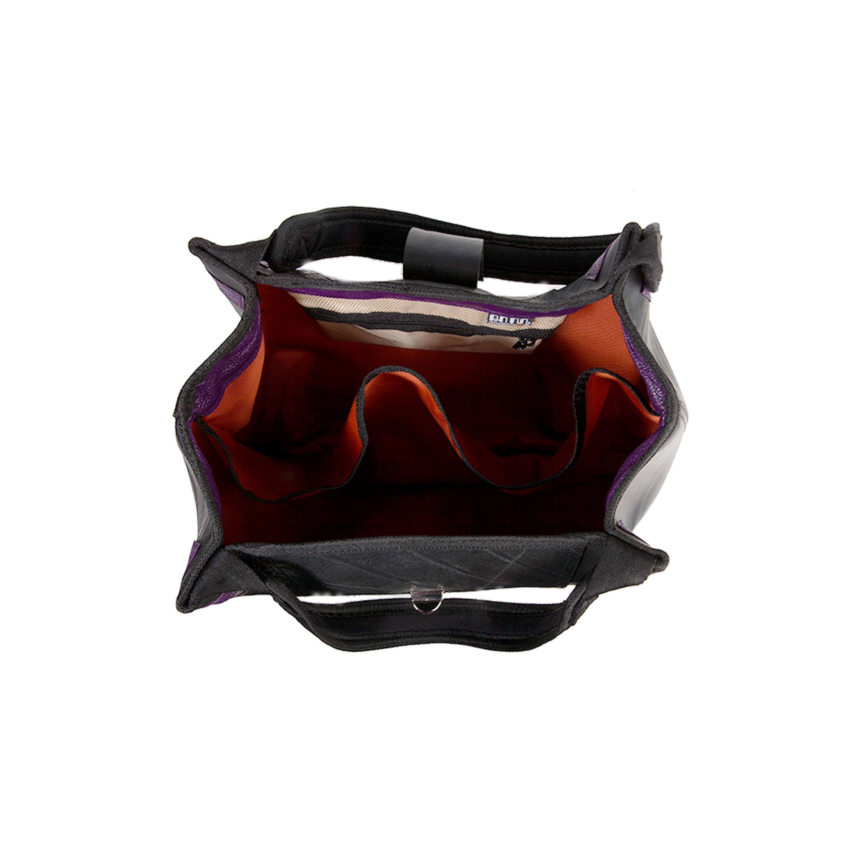 Top view of Paguro Upcycle recycled rubber tote bag showing spacious interior and organized compartments